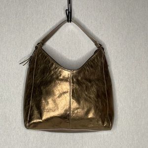 Rolfs, Genuine shoulder, golden bag.